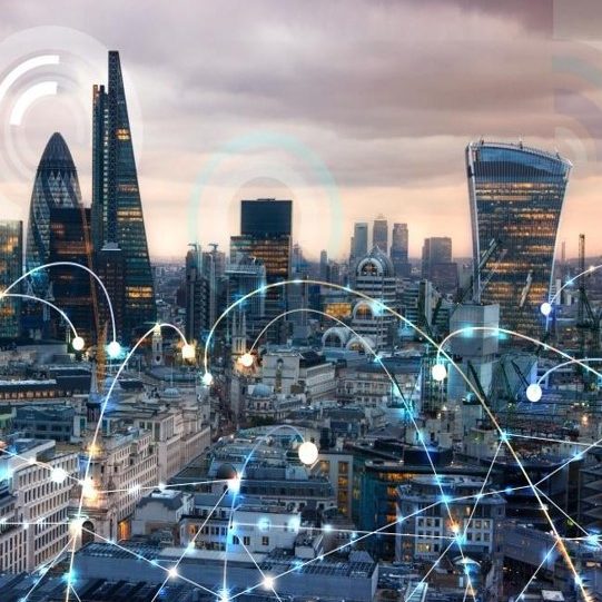 London city with digital network overlays against a cloudy sky.